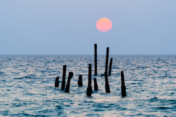 Old wooden bridge at Pilai Beach, Phang Nga Province