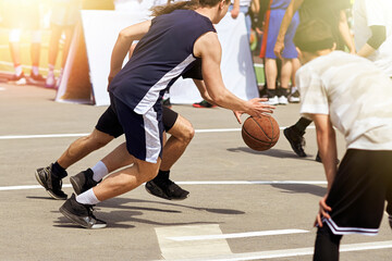 Guys with a basketball on the background of the city.