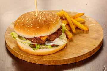 Burger with beef, vegetables and cheese