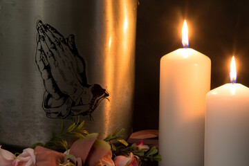 Metal urn with ashes of a dead person on a funeral. Sad grieving moment at the end of a life. Last...