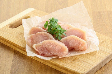 Raw chicken breast slices for cooking