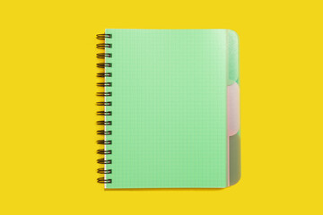 green spiral notebook. school and office accessories
