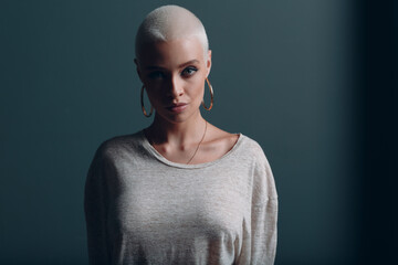 Millenial young woman with short blonde hair portrait