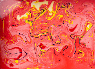 Stains of paint on the water,Abstract red background,Contemporary art.