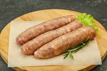Raw pork meat sausages for grill