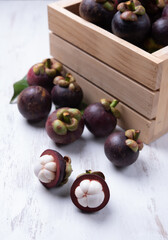 Thai fruit,Tropical mangosteen on white wood table