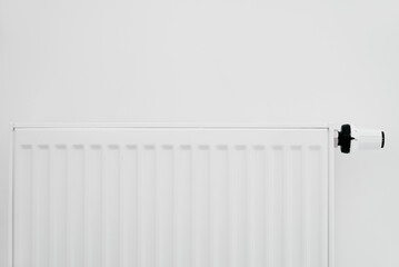 Heat radiator knob. Adjusting temperature on heating radiator