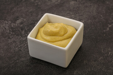 Dijon mustard sauce in the bowl