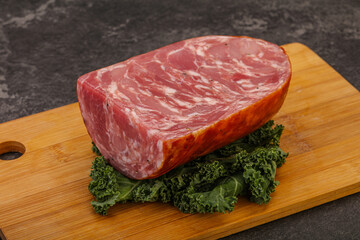 Beef ham piece over board