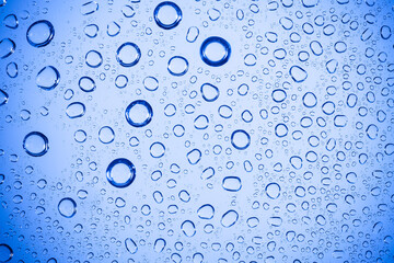 Water bubble on Blue glass.