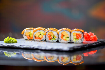 Maki Futomaki Sushi Rolls with eel, egg, unagi sauce. Sushi menu. Japanese food.