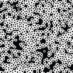 Seamless vector pattern.
Natural circular shapes texture. Black and white cellular organic texture.
