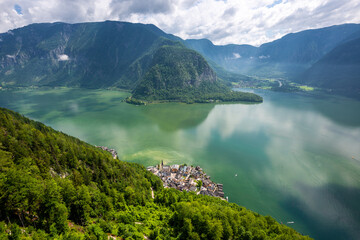 Aerial view of famous Hallstatt mountain village in the Austrian Alps at beautiful light in summer.