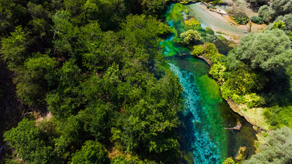 Naklejka na ściany i meble Beautiful turquoise spring Blue Eye, Albania. The spring is very powerful, cold and deep and is a source of a river Bistrice