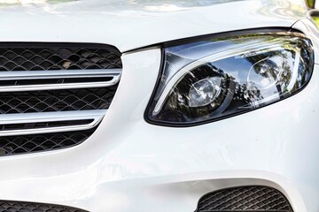 Close - up Modern white car headlights