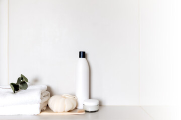 White bathroom, bath accessories. Household, hotel cleaning concept