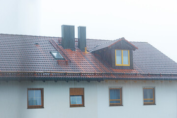 heavy rain over a duplex house