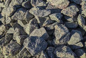 Grey Granite Chipping. Crushed Stones Background copy space. Macro Photo of Crushed Rock Texture 