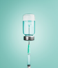 syringe and vaccine bottle with liquid