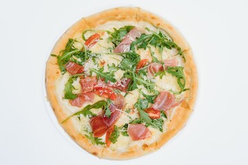 Delicious italian pizza over white background top view