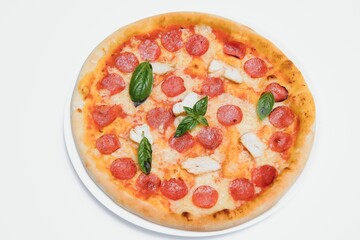 Mixed pizza from top isolated on white background clipping path included.