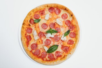 Mixed pizza from top isolated on white background clipping path included.