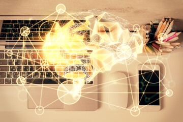 Multi exposure of brain sketch hologram over topview work table background with computer. Concept of big data.