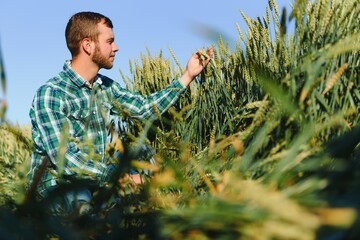 Portrait of a young handsome biologist or agronomist.