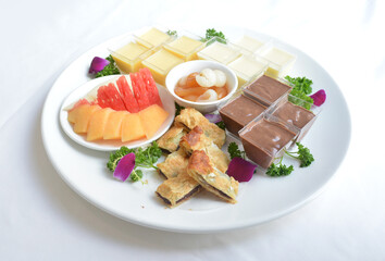 cold sweet dessert platter with pudding, mango, fruits, deep fried red bean paste, jelly,...