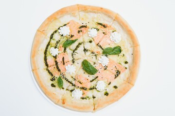 Delicious italian pizza over white background top view