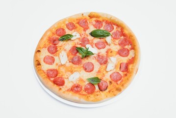 Delicious italian pizza over white background top view