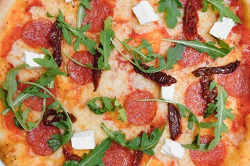 Mixed pizza from top isolated on white background clipping path included.