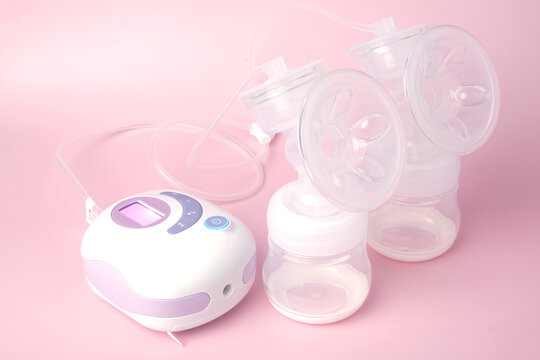 A picture of portable breast pump been switch on before lactate. High demand breast pump as can use battery and direct power source.