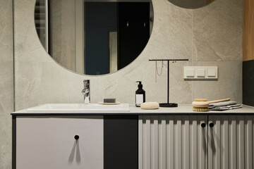 .Stylish composition of modern bathroom interior. Designed shower, mixed wood commode, mirror and personal accessories. Walls with black and wooden panels. Minimalistic masculine concept. Template..