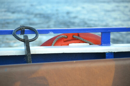 Ship board with lifesaver ring. Closeup. Marine background. Travelling. 