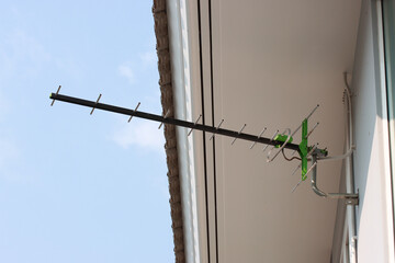 TV UHF Yagi antenna install on the wall of a house to receive DVB-T broadcast