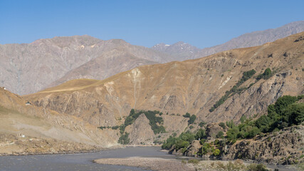 Scenic mountain landscape panorama of the Panj river valley bordering Afghanistan, Darvaz, Gorno-Badakshan, Tajikistan
