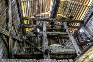 Wooden millstones and beams of an old mill