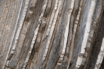 Fototapeta premium texture of the flisch of itzurum beach, zumaia