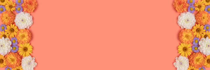 Banner with frame made of flowers texture on a coral background with copyspace. Creative floral...