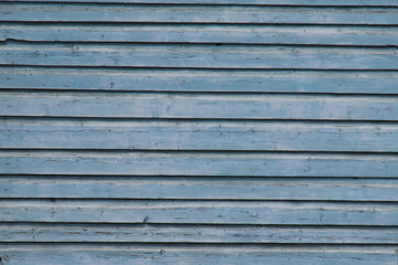 Obraz premium Blue wooden wall. Rustic background with copy space.