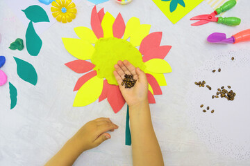 DIY home made Sunflower from paper, plasticine with natural watermelon seeds. reuse that what you...