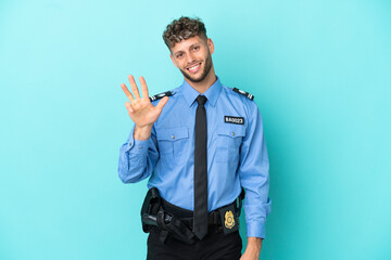 Young police blonde man isolated white on blue background happy and counting four with fingers