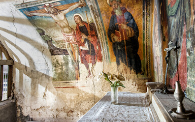 Cammoro, Umbria, Italy,ancient frescoes in a small votive chapel along the ancient via della Spina