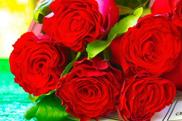 Beautiful red rose bouquet. Noble red roses with bright bokeh
