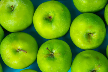green apples on blue background, fruits