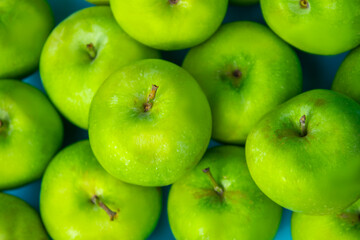 green apples on blue background, fruits