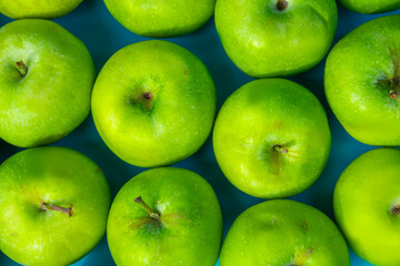 green apples on blue background, fruits