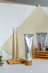Fototapeta na wymiar bio-degradable, compostable bamboo toothbrushes in a spa setting. Green concept, zero waste