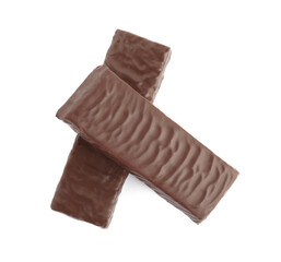 Tasty chocolate glazed protein bars on white background, top view. Healthy snack